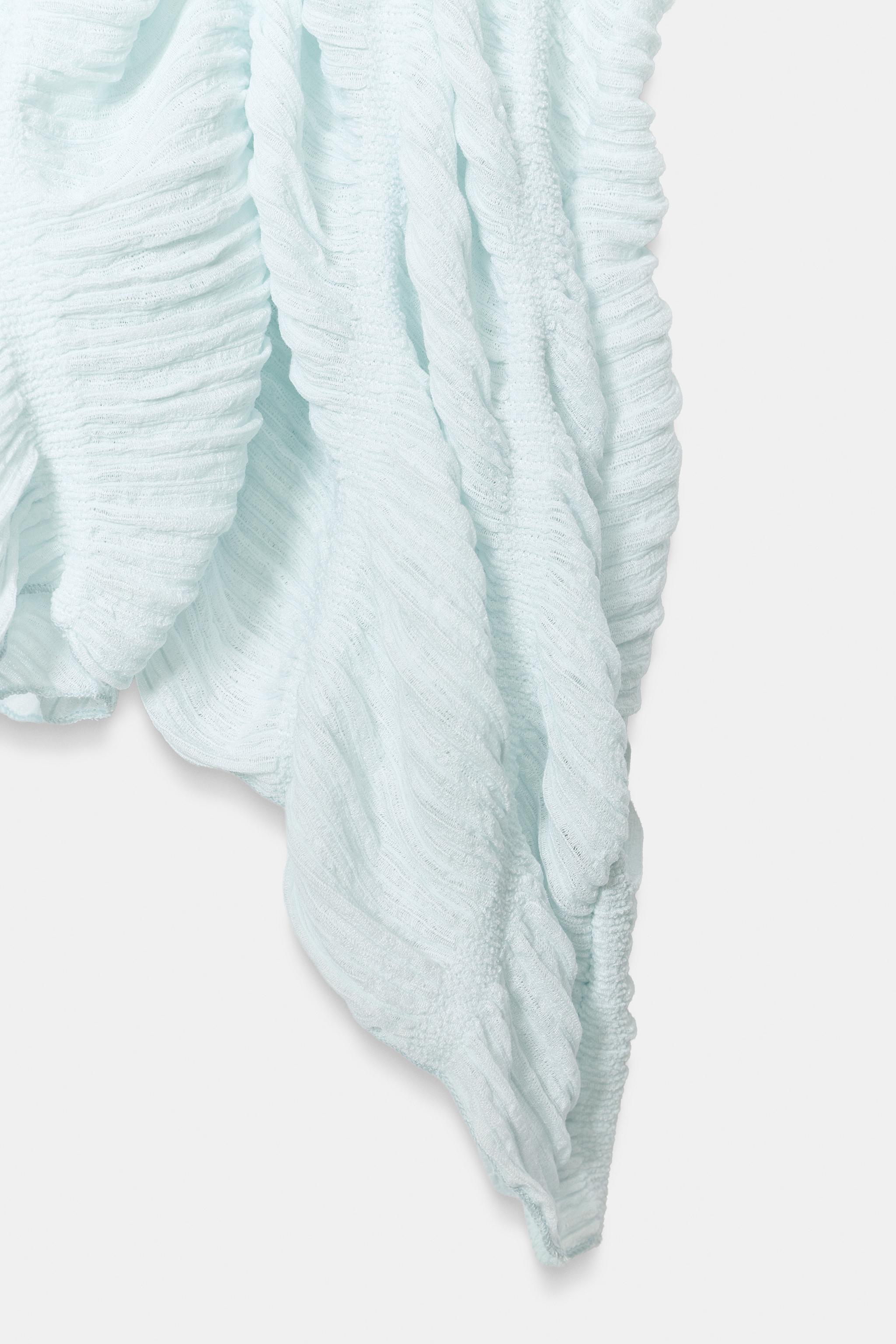 TEXTURED CAPE TOP